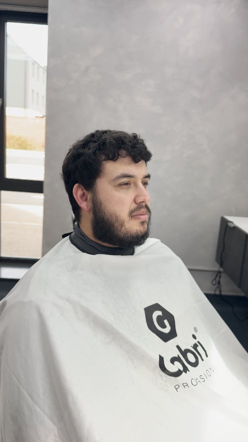 Before — curly top and full beard